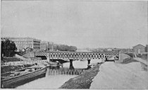 Puente con vigas de celosía de madera, década de 1870