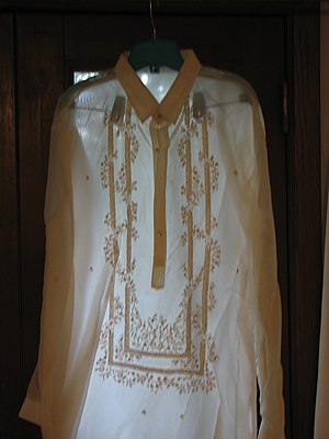 A barong Tagalog placed against the light, showing the translucency of the fabric