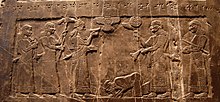 King Jehu of Israel bows before Shalmaneser III, late 9th century BCE Black Obelisk Yehu in front of Shalmaneser III.jpg