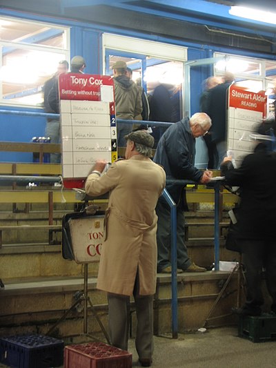 Bookmakers on a greyhound race course, Reading, Berkshire