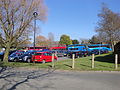 Various buses at Medina College, Newport, Isle of Wight, that had arrived early ready to perform school services after the school had finished for the day. A similar scene is also photographed here (when the school was called Medina High School), before Southern Vectis had taken over the whole school bus network. Further changes have happened since this photo was taken in March 2012, as all buses are now branded as "Vectis Blue".