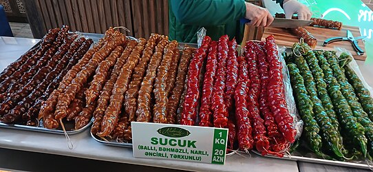 Pekmez, honey, pomegranate and tarragon churchkhelas sold in a Shaki city of Azerbaijan