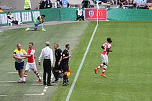 Campbell making his debut for Arsenal in the 2014 FA Community Shield