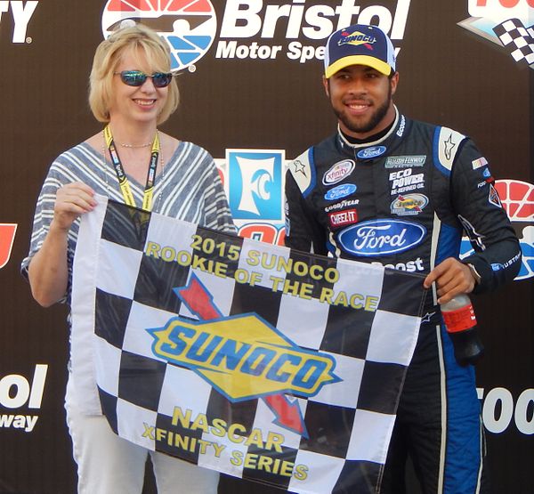 Wallace (right) with the Sunoco Rookie of the Race Award at Bristol Motor Speedway in 2015