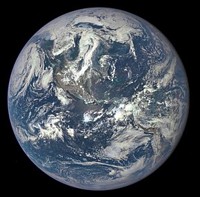 The first EPIC image, released by NASA on 6 July 2015, shows the full sunlit Earth from 1,475,207 km (916,651 mi) or nearly four lunar distances away, centered on the Americas. Earth-DSCOVR-20150706-IFV.jpg