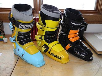 Three generations of Flexon. In the center is the original design, on the right is an example from the Kneissl years, and on the left the re-released Full Tilt versions. All three of these have custom replacement liners. Flexon ski boot evolution.jpeg