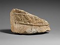 Thumbnail for File:Fragment of an male limestone votary with an Egyptianizing kilt MET DP210409.jpg