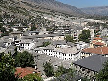 zhvillimi i turizmit ne shqiperi 220px-Gjirokaster%2C_view_from_street_to_castle_1