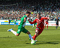 * Nomination Hammarby IF vs IFK Värnamo, April 14, 2013. Michael Timisela (left) and David Björkeryd. --ArildV 11:01, 15 April 2013 (UTC) * Promotion Good quality. --Poco a poco 20:00, 15 April 2013 (UTC)