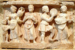 Wine-drinking and music, Hadda (1st–2nd century)