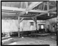 Interior, garage area - F. L. Mattock Building, 60 South Main Street, Eureka Springs, Carroll County, AR HABS ARK,8-EURSP,1-21.tif