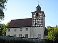 Evang. Kirche mit ummauertem Kirchhof