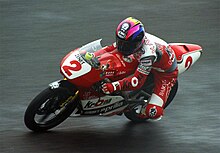 Kazuto Sakata (pictured at Suzuka) became the 1994 125cc world champion Kazuto Sakata 1994 Japanese GP.jpg