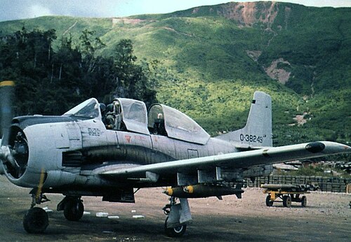 A Royal Lao Air Force (RLAF) T-28D Nomad armed trainer taxies at Long Tieng airfield, September 1972