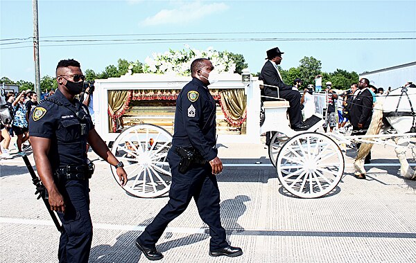 The carriage carrying Floyd's casket to his burial in Pearland, Texas, on June 9, 2020