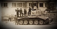Lebanese Arab Army (LAA) soldiers on top of a captured Charioteer tank, Lebanon, 1 January 1978 Lebanese arab army soldiers with amx tank 1978.jpg