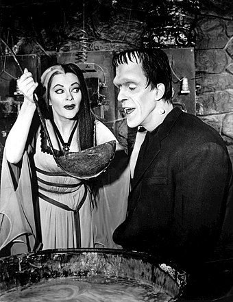 De Carlo with Fred Gwynne as Lily and Herman Munster in 1964