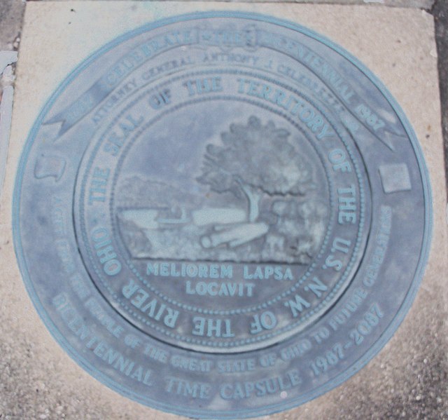 Seal of the Northwest Territory over a time capsule outside the Campus Martius Museum. The Latin phrase, "He has planted one better than the one falle