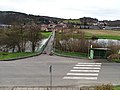 Čeština: Nižbor-Stradonice, okres Beroun. Lávka přes Berounku, z vlaku, autobusová zastávka na silnici 116. English: Nižbor-Stradonice, Beroun District, Central Bohemian Region, Czech Republic. A footbridge over the Berounka, seen from the Křivoklát Expres. Camera location 49° 59′ 43.1″ N, 14° 01′ 32.8″ E    View all coordinates using: OpenStreetMap