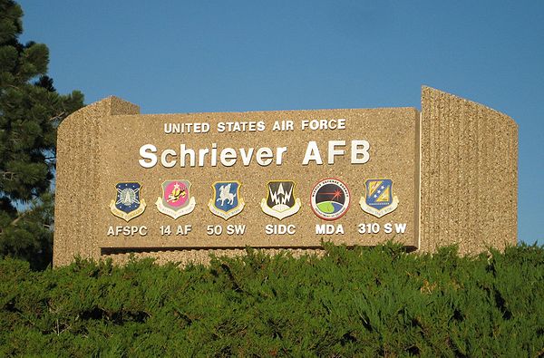 Schriever's old main gate sign with tenant units listed below.