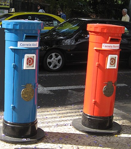 Pillar boxes on the island of Madeira, Portugal. (1st class mail in blue and 2nd class in red)