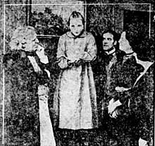 The cast in a scene from the film Pollyann-bessielove-1917-scene-newspaper.jpg