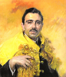 Portrait of Fernando Bissaya Barreto wearing academic regalia. A scholar and politician, he was the founder of Portugal dos Pequenitos in Coimbra, Portugal. Retrato do Professor Bissaya Barreto - Jose Malhoa (Casa-Museu Bissaya Barreto).png