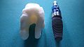 Root analogue ceramic dental implant vs titanium screw type implant.jpg