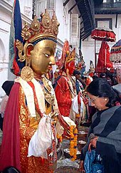 Samyak, a Buddhist festival during which statues of Buddhas from the ancient monasteries are displayed together. Note the statue of Hanuman next to the Buddhas in the picture, a common example of religious harmony in Kathmandu.