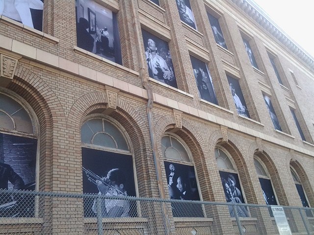 Windows of that San Francisco Unified School District building covered with photos of jazz legends.