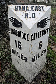 Sign at the crossroads in Leeming Bar. This is on Roman Road, the original A1 road Sign at the crossroads in Leeming Bar.jpg