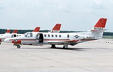 Several U.S. Navy T-47A radar systems trainers seen in 1989 T-47A Citation aircraft are parked on the runway. The Citation is used for training naval flight officers - DPLA - 115f98dfa39a6f8ed00c920f88833139.jpeg