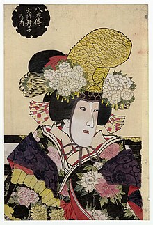 Utagawa Kunisada II - Actor Iwai Kumesaburô III as the Shirabyôshi Dancer Asakeno, Actually Inuzaka Keno Tanutoshi.jpg