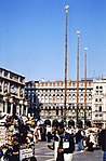 3 flagpoles in front of San Marco, entrance to the merceria