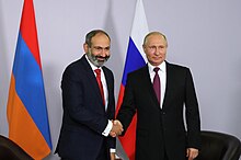 Russian President Vladimir Putin shakes hands with Armenian Prime Minister Nikol Pashinyan. Vladimir Putin and Nikol Pashinyan (2018-05-14) 02.jpg