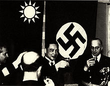 Wang Jingwei of the Wang Jingwei Government, a rival Chinese state that was formed by the Empire of Japan as a puppet government to oppose the Republic of China (Taiwan) regime under President Chiang Kai-shek, meeting with Nazi diplomats in 1941 Wang and Nazis.jpg