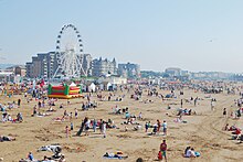 Weston-super-Mare beach seen from the Grand Pier, showing the popularity of the town as a tourist destination on the Easter bank holiday weekend (in 2011) Weston-super-Mare beach from the Pier.jpg