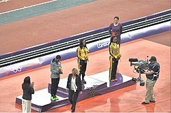 Womens 100 m medal ceremony - 2012 Olympics.jpg