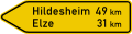 Zeichen 418-10 Wegweiser auf sonstigen Straßen mit größerer Verkehrsbedeutung (linksweisend)