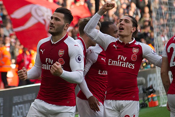 Arsenal players Sead Kolašinac (left) and Héctor Bellerín celebrating the former's goal against Swansea City in October 2017.