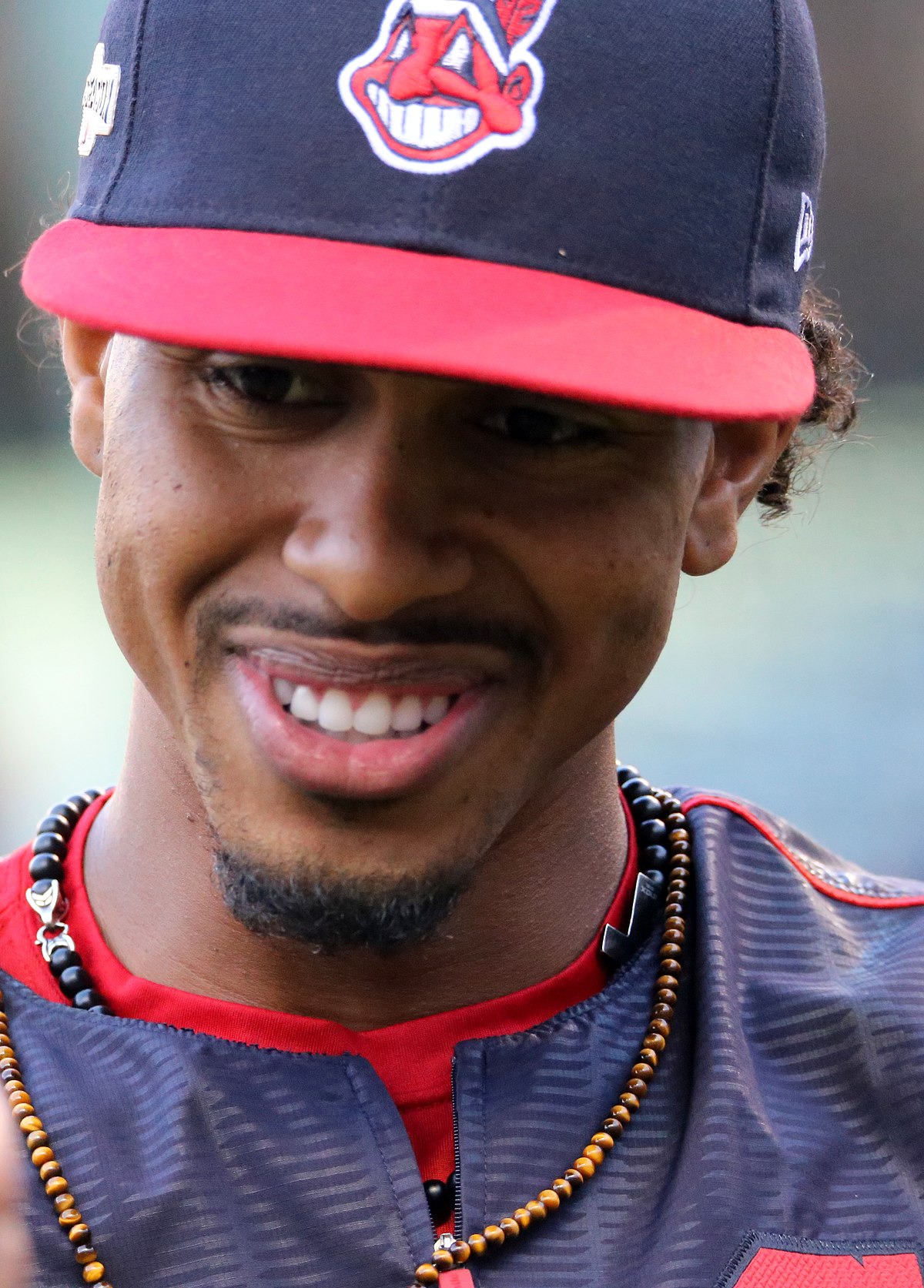 Cleveland Indians shortstop Francisco Lindor, uses his teeth to