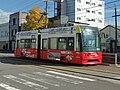 企業ラッピングされた9602号（車検のコバック、2021年）