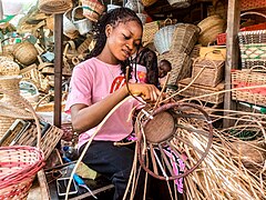 A Lady Making a Basket Used for Carrying Goods.jpg Photographer: Frankincense Diala