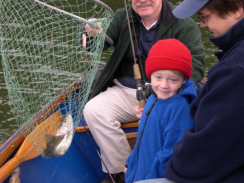 File:A four year old kid poses with his first fish.jpg