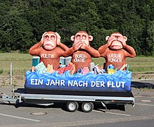 Sculpture of the three wise monkeys by Jacques Tilly one year after the 2021 Flood in the Ahr Valley.