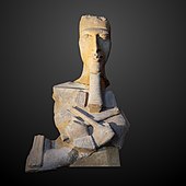 Statue of Akhenaten; c. 1350 BC; painted sandstone; 1.3 × 0.8 × 0.6 m; Louvre