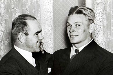 Estonians August Neo (left) and Kristjan Palusalu won medals in both wrestling styles at the 1936 Olympics August Neo and Kristjan Palusalu.jpg