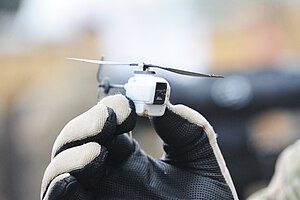 A Black Hornet Nano helicopter unmanned aerial vehicle (UAV) (2013) Black Hornet Nano Helicopter UAV.jpg