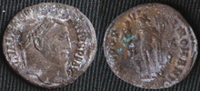 Unidentified sodium carbonate crystals (white) formed on the same Roman coin treated for bronze disease. The green masses on the coin's reverse are a copper carbonate which formed in the region where the bronze disease was most prevalent. It will be physically removed to ensure that the chlorides have also been removed prior to further conservation efforts. The photos were taken some 20 minutes after rinsing and surface drying. Carbonate crystals formed on ancient bronze coin.png