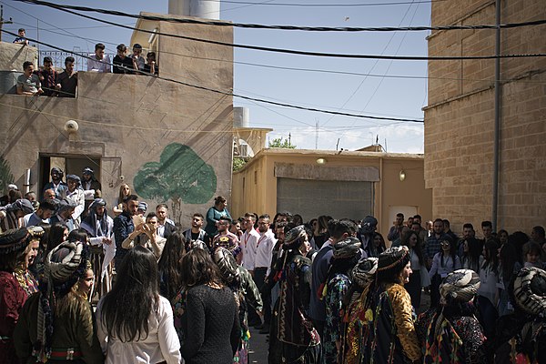 Chaldean Catholics wearing traditional clothes during Palm Sunday 2018 in Alqosh